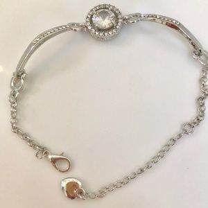 Silver, Swarovski covered tennis bracelet.